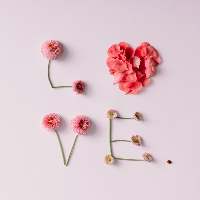 love spelled out in flowers